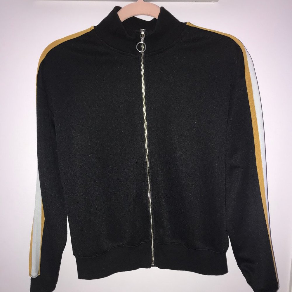 Black zip-up sweater with yellow/white stripe
